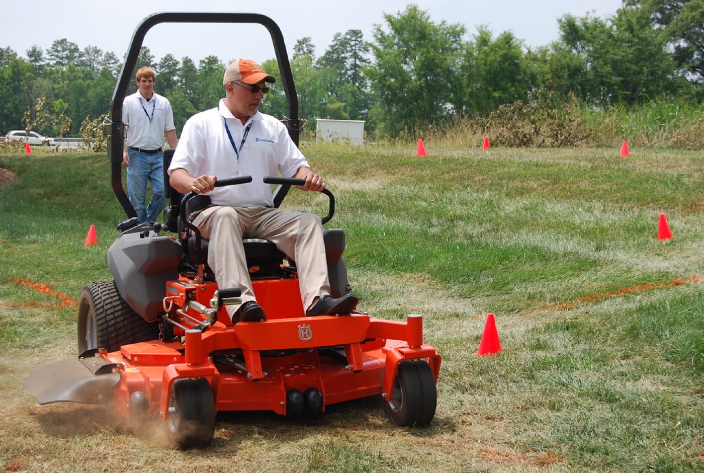 Operator trimming with a commercial petrol brushcutter